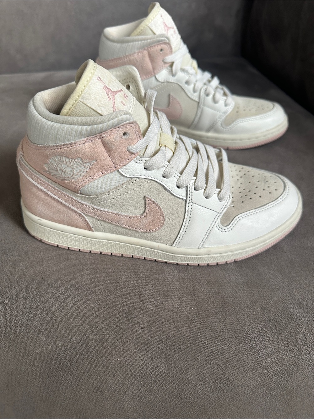 Jordan Women’s High-Top Sneakers in White and Pale Pink